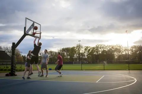 Group of people playing basketball